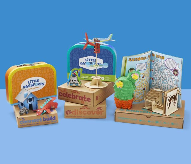 Subscription boxes from Little Passports with the products inside them