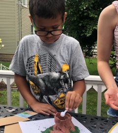 UGC - child with Science Junior volcano activity