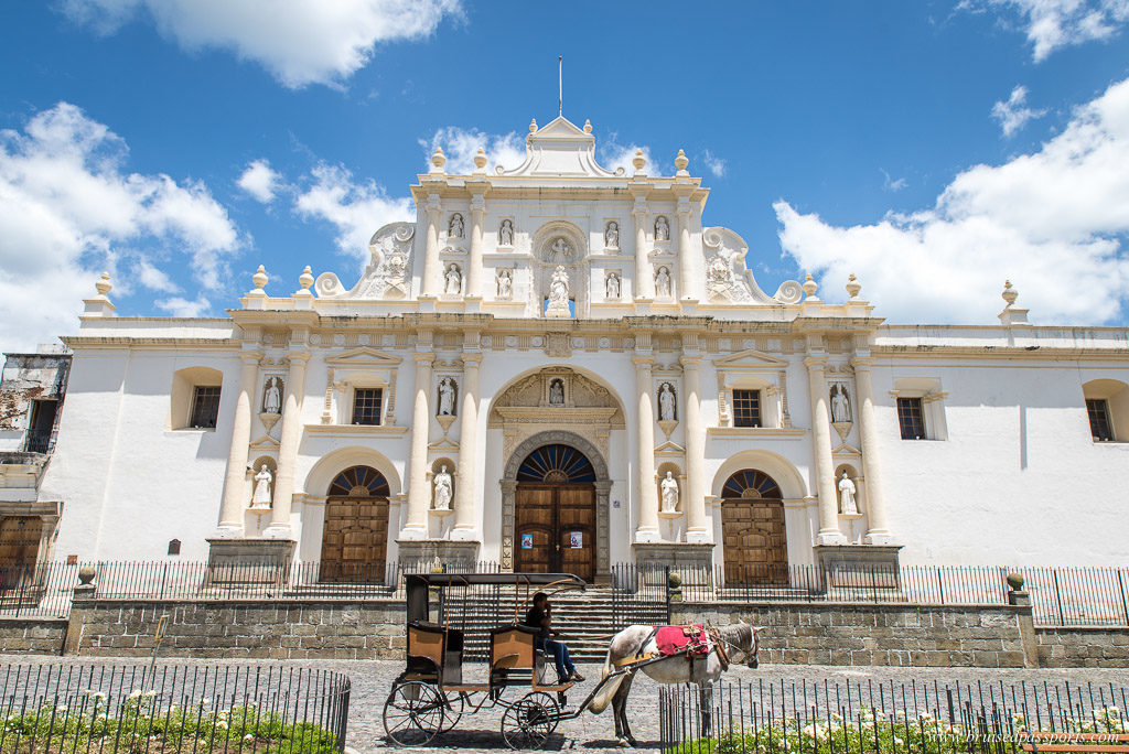 Horse drawn carriage in front of San Jose Cathedral Antigua Guatemala