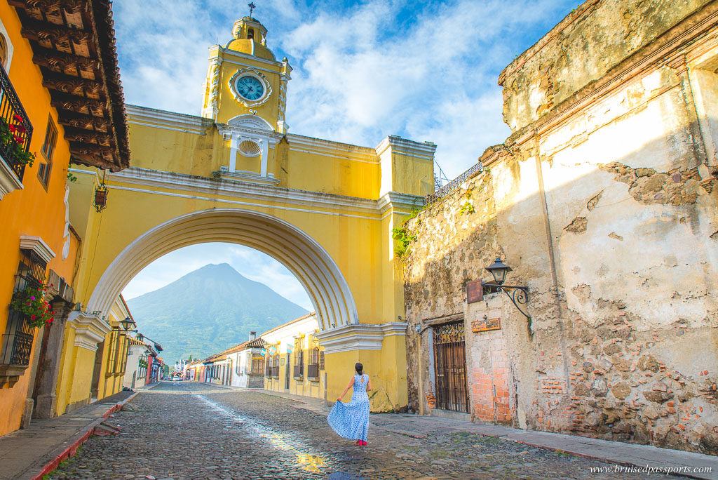 Sunrise at Santa catalina arch and clock tower in Antigua Guatemala