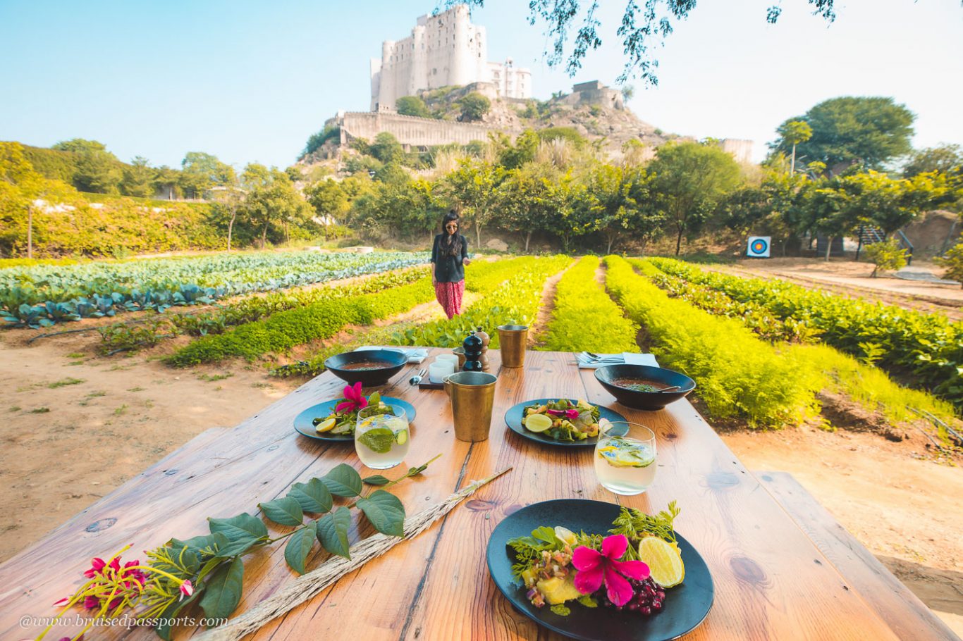 romantic lunch setting at Alila Fort Bishangarh in their organic garden