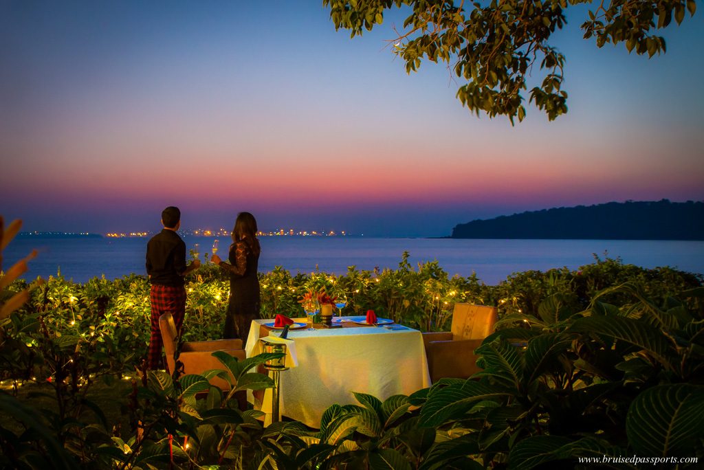 couple at sunset dinner in Grand Hyatt Goa