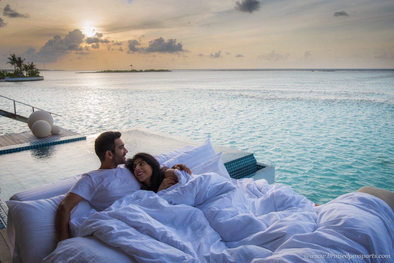 Sunrise at Club Med finolhu over water villas in Maldives