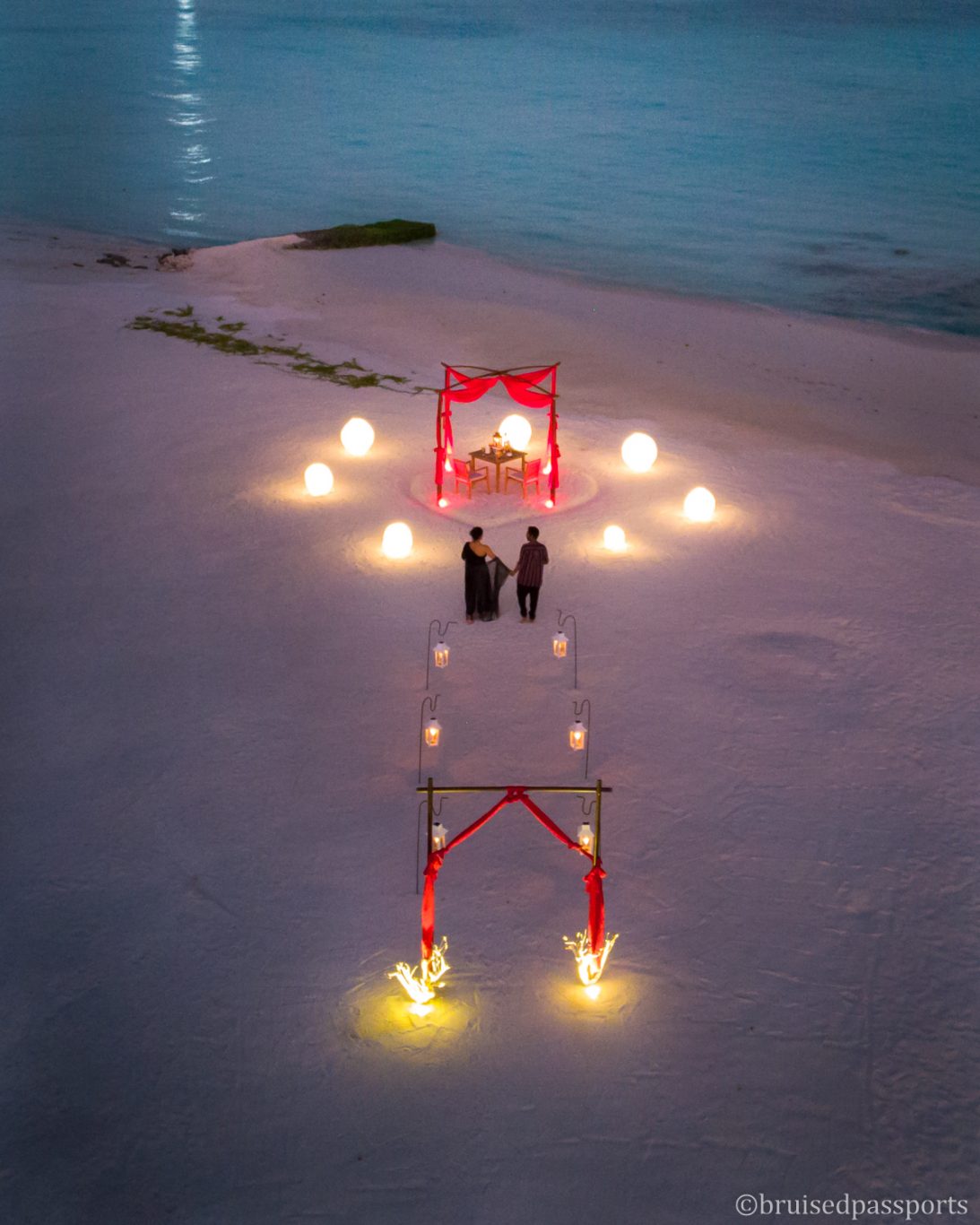 Romantic dinner setup by the beach in Maldives