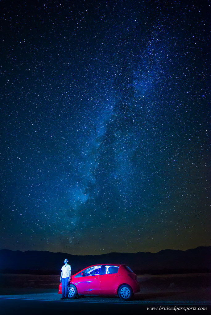 Night sky milky way with car in Death Valley National Park