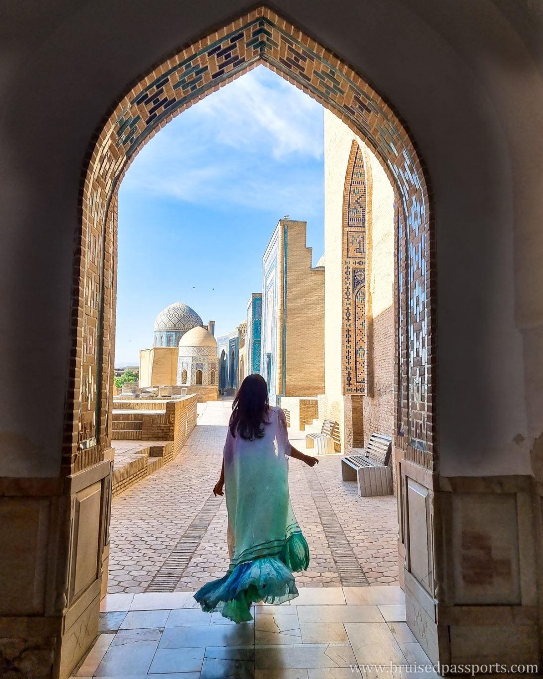 girl framed under arch at Shah-i-Zinda in Samarkand, Uzbekistan