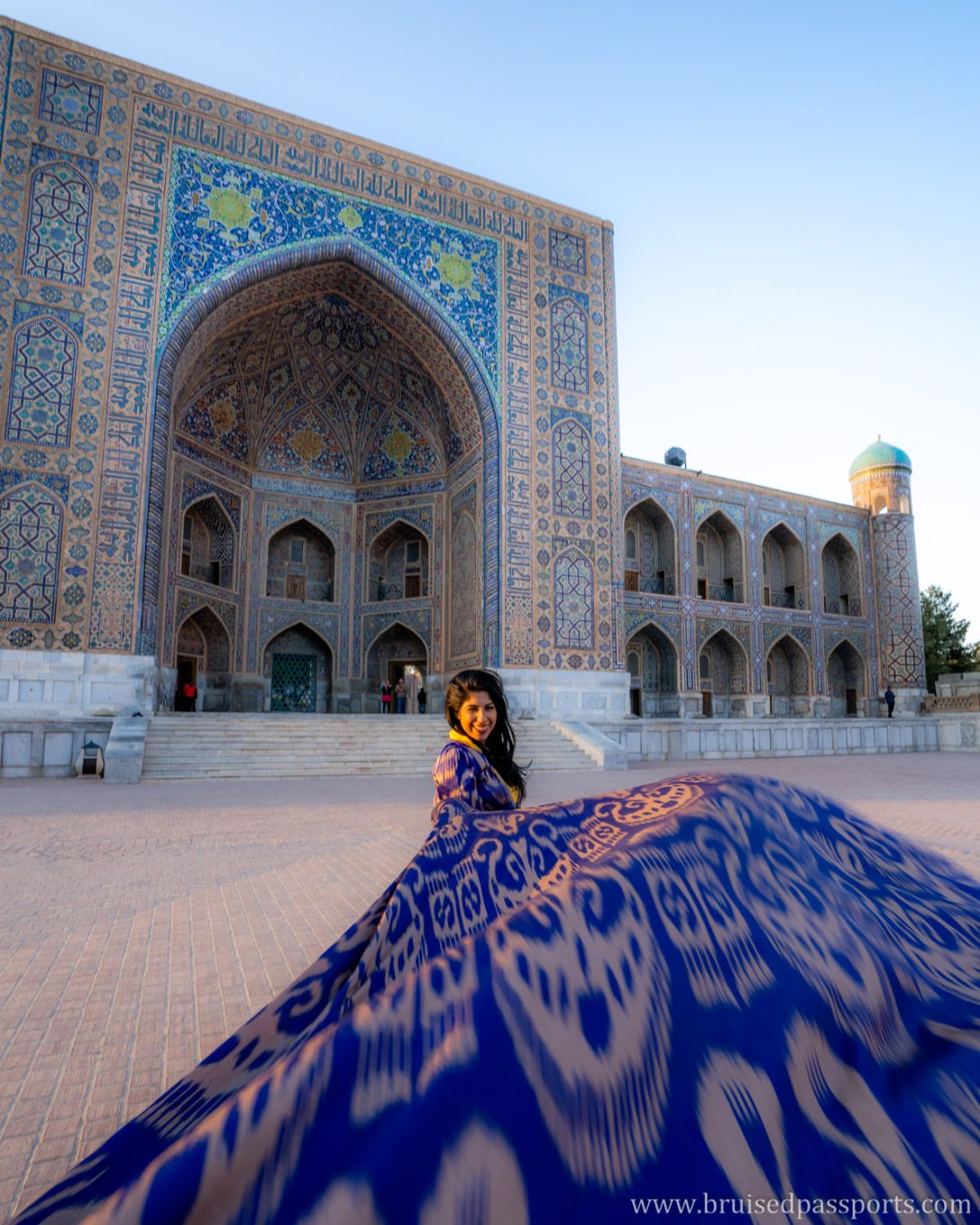 Girl with flowing dress at Samarkand Registan Uzbekistan