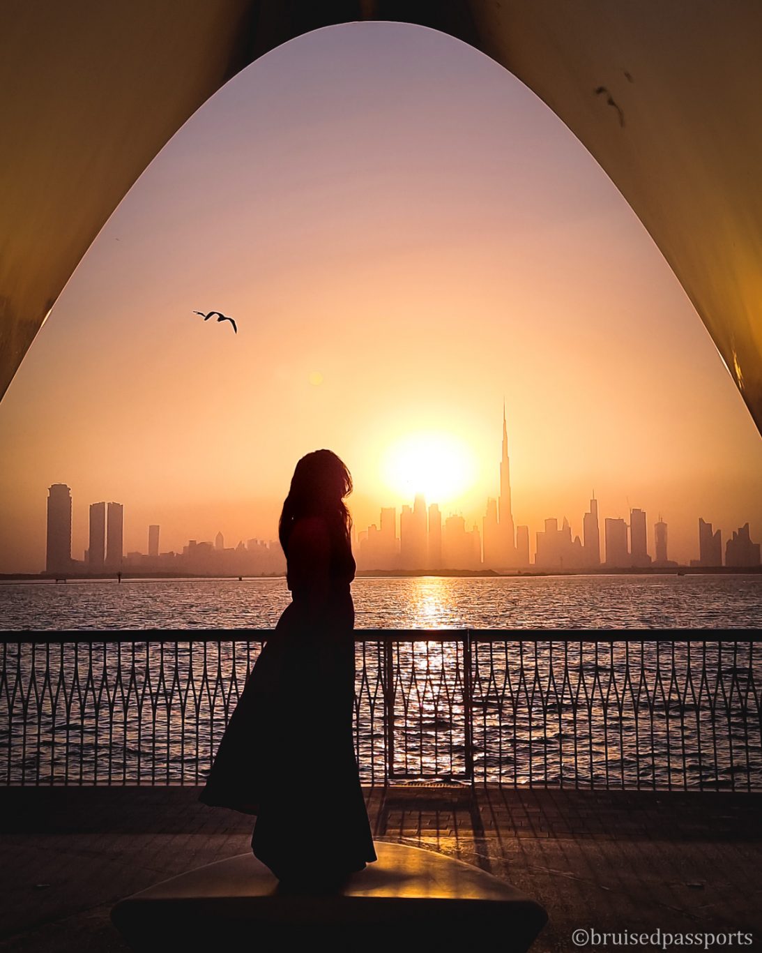 Girl at sunset at Dubai Creek Harbour