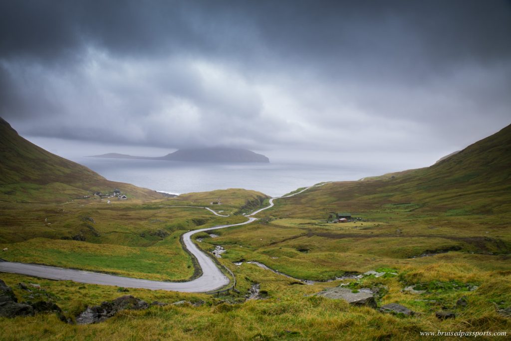 Winding road leading to Nordadalur in Faroe Islands