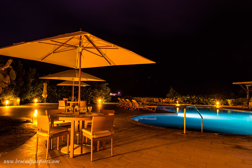 Pool side dinner setting at Finch Bay Hotel Galapagos