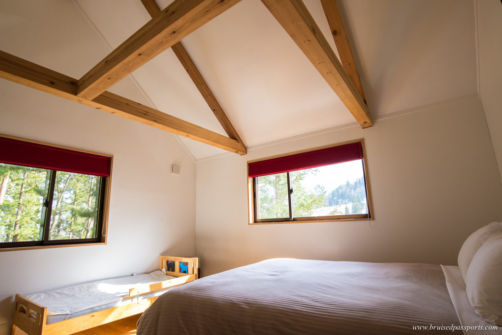 Bedroom with a view at Alps View Chalet Hakuba