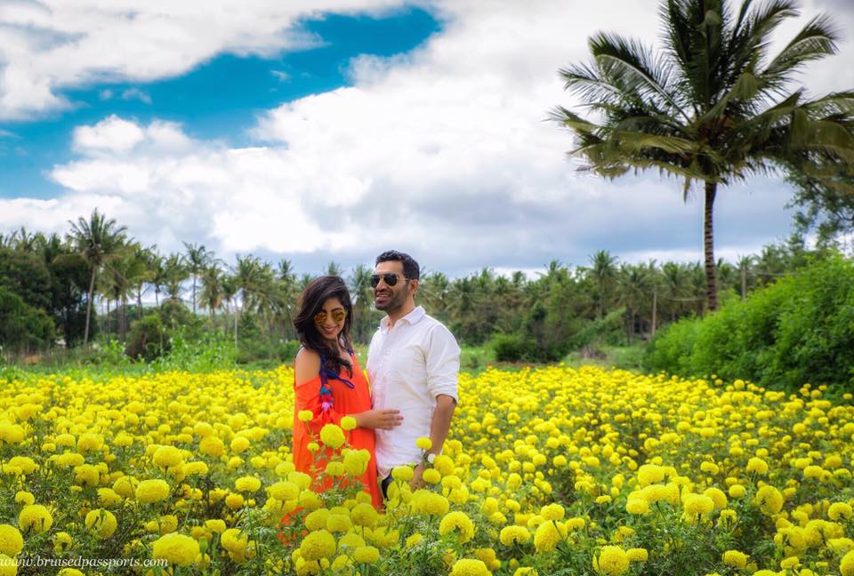 couple in sunflower fields mysore ooty highway