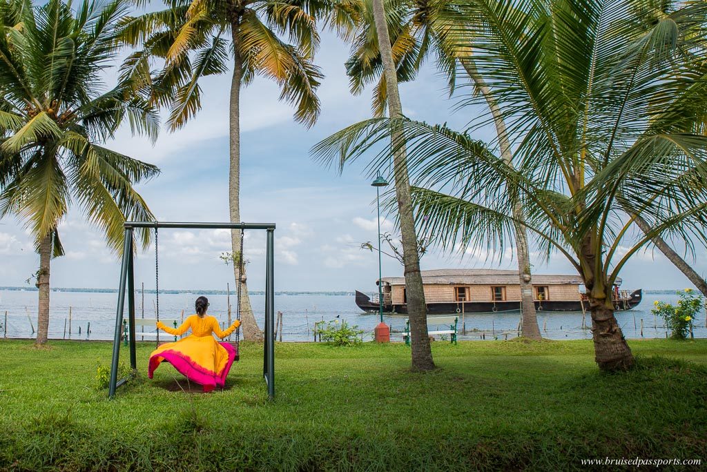 girl at the iconic backwaters of Kerala at Kumarakom