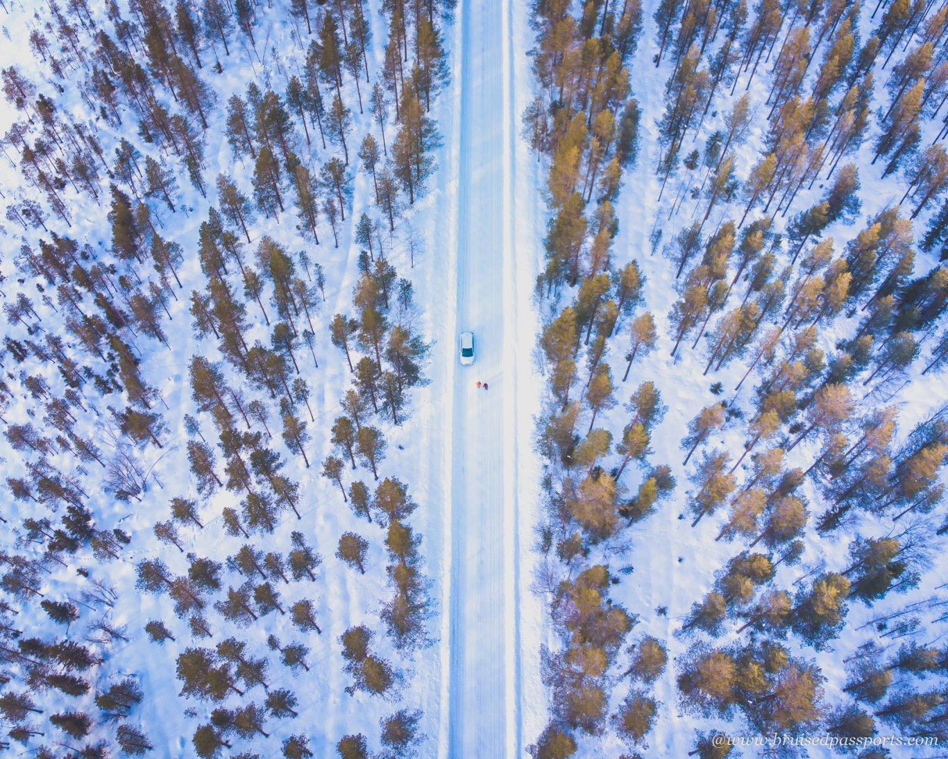 Winter road trip drone shot in Lapland