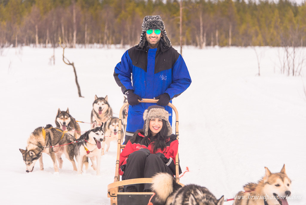 Us on husky sled in Rovaniemi