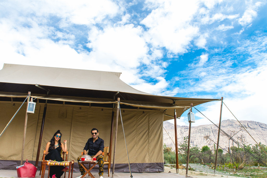 Couple having breakfast at our camp site in Nubra Valley, Ladakh