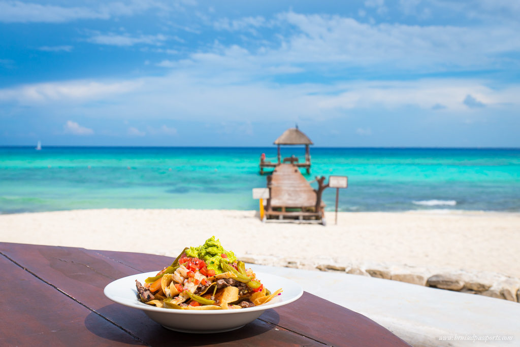 nachos and guacamole by the beach in Playa Del Carmen