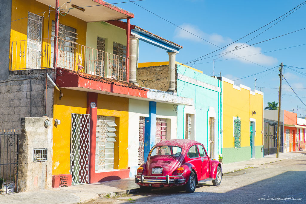 Merida vintage car and colourful houses