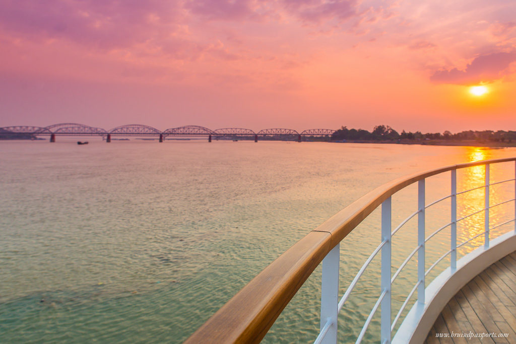 The sun sets as we cruise down the Irrawaddy river