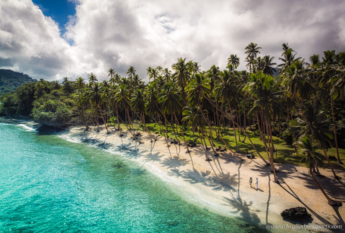 couple walking on the beach at Namale Resort and Spa Fiji