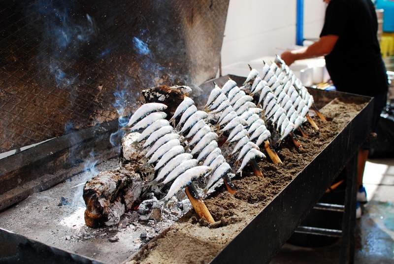 Offbeat Spain Malaga Feria grilled sardines