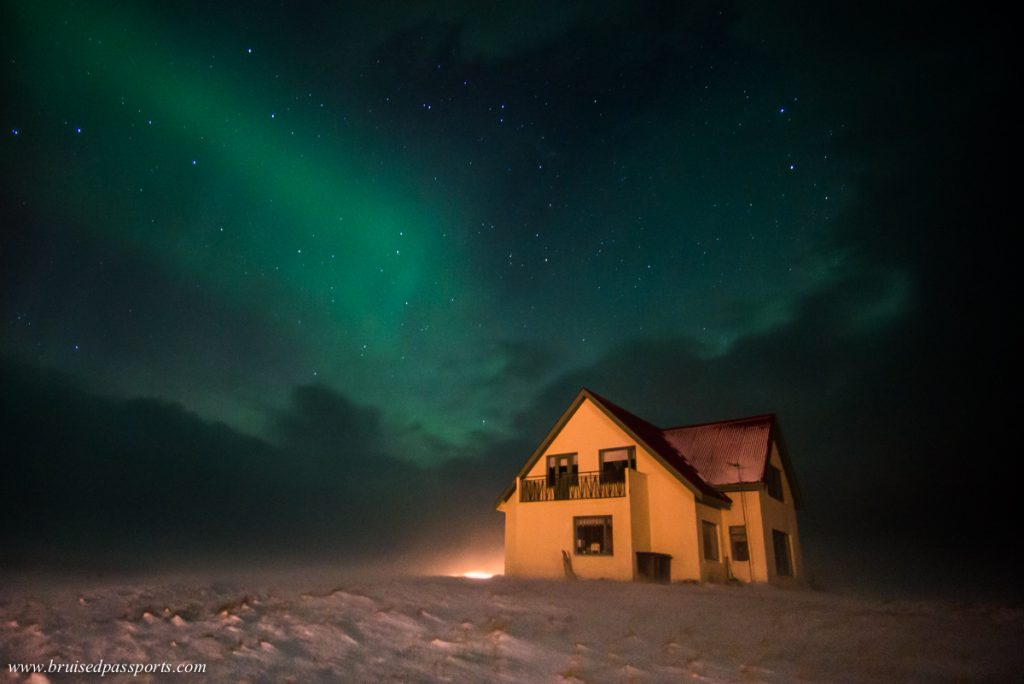 Northern Lights over a hut in Iceland