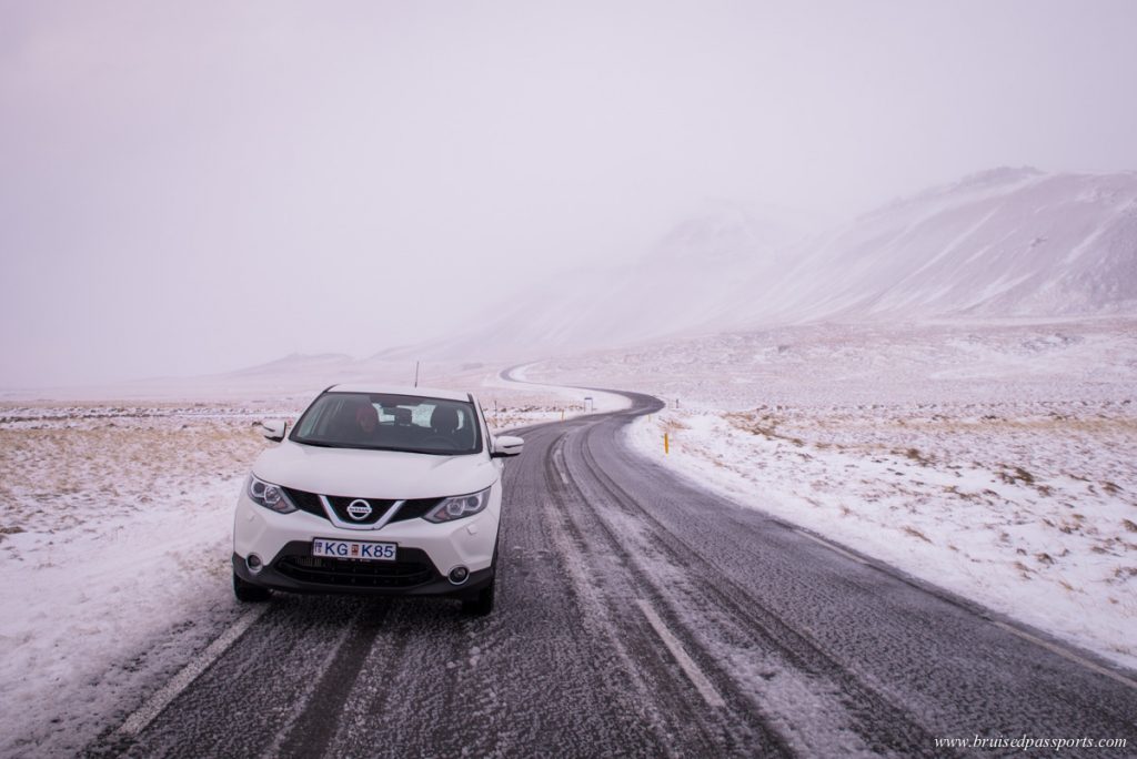 car with winter tyres for road trip in Iceland