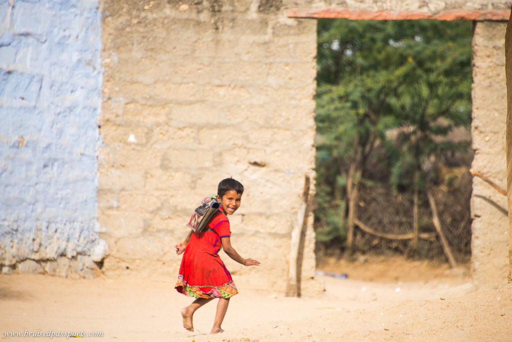 girl running to school in Rajasthan