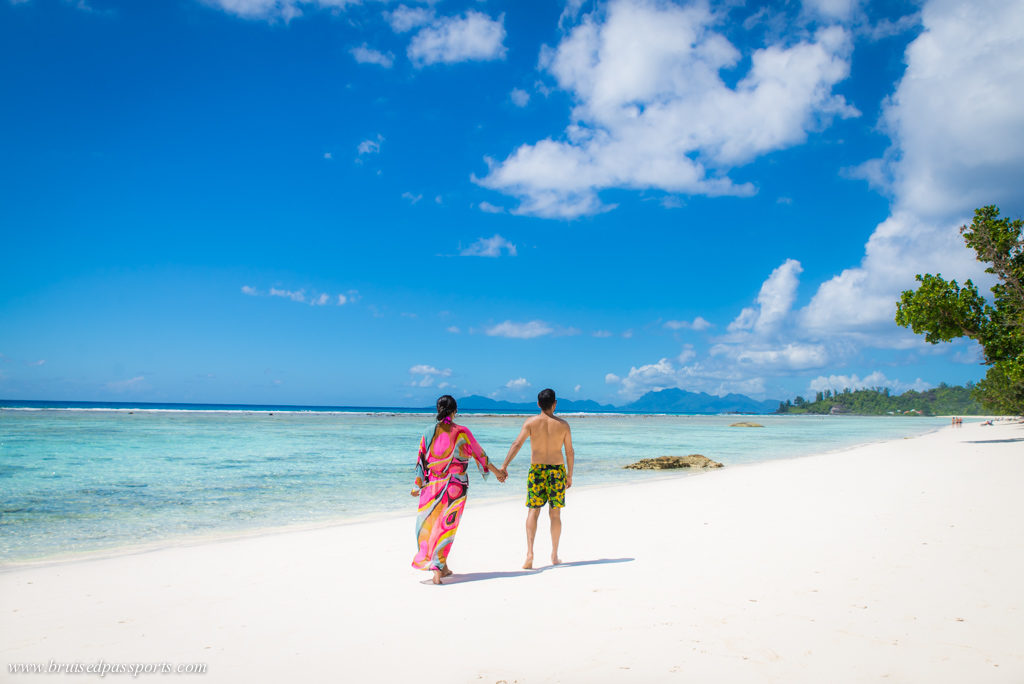 Couple on a beach in Labriz Seychelles