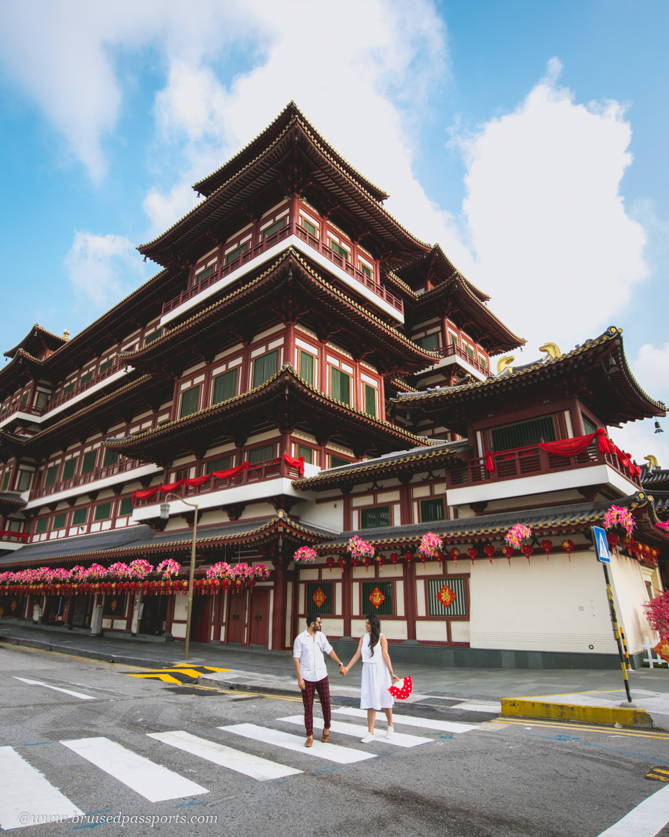 couple at tooth relic temple in Singapore's Chinatown