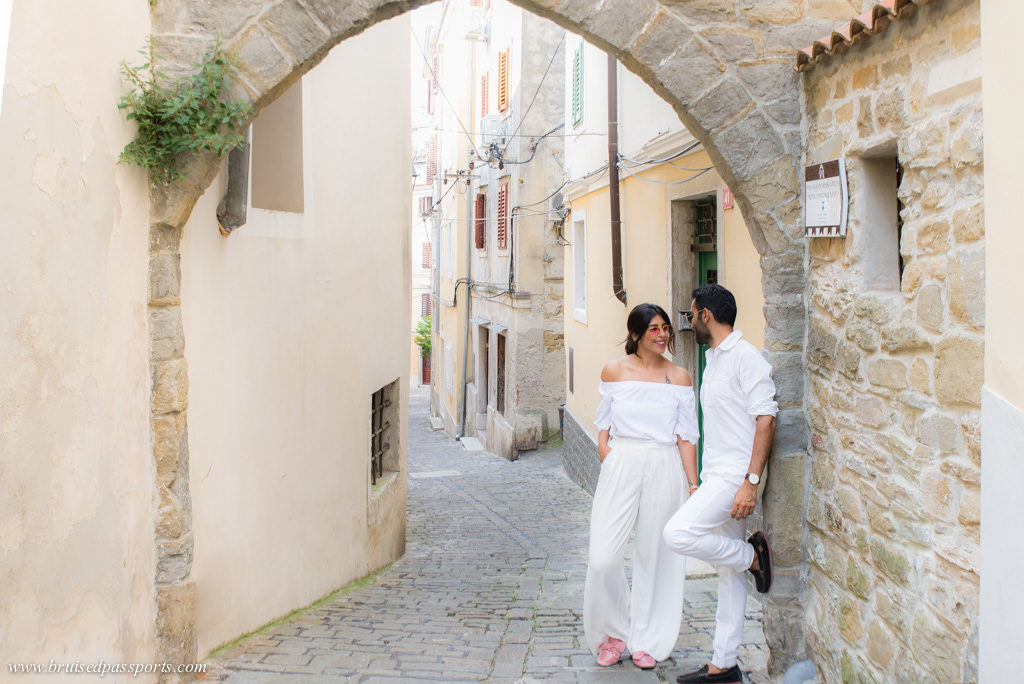 Couple in old town of Piran