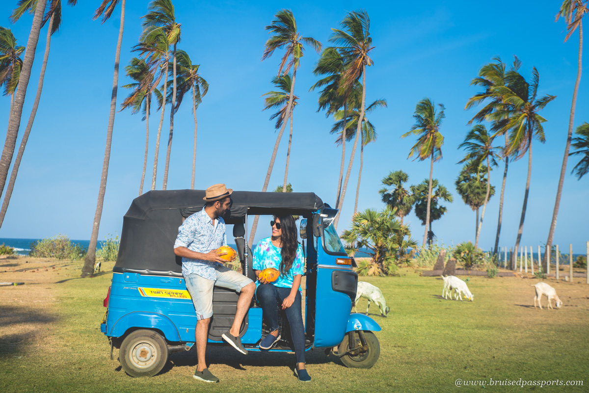 couple on a rented tuk tuk in Arugam Bay