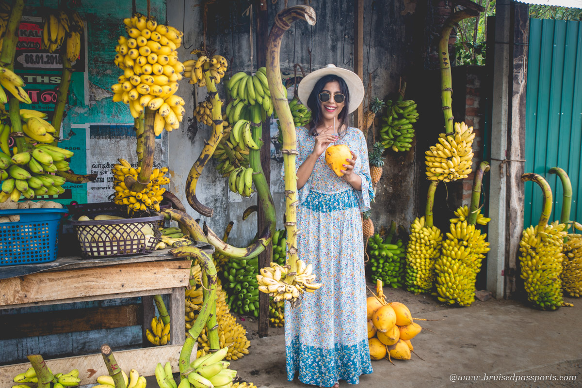 Girl in a fruit stall in Sri Lanka