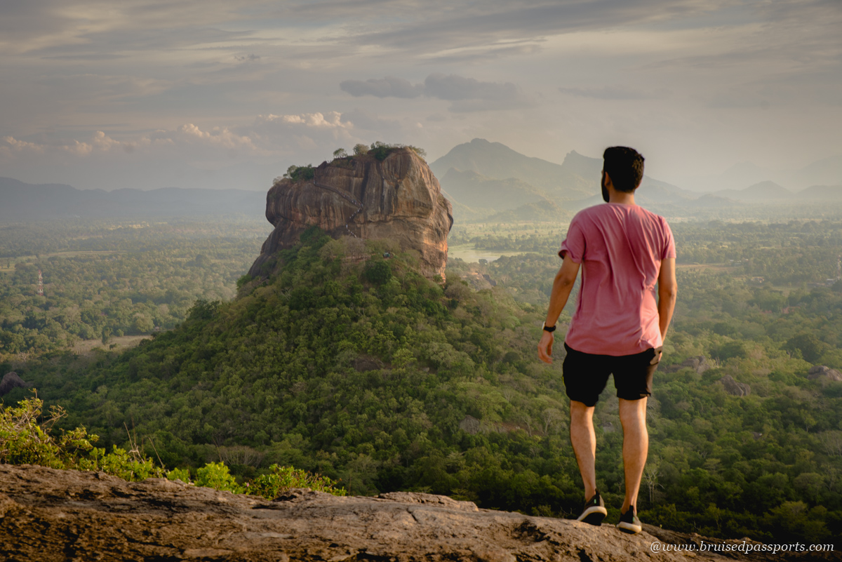 sunset at Pidurangala rock with view of Sigiriya rock